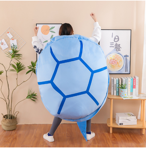 La muñeca de concha de tortuga de juguete se puede usar y acostar