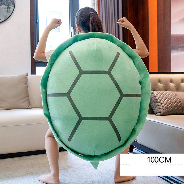 La muñeca de concha de tortuga de juguete se puede usar y acostar